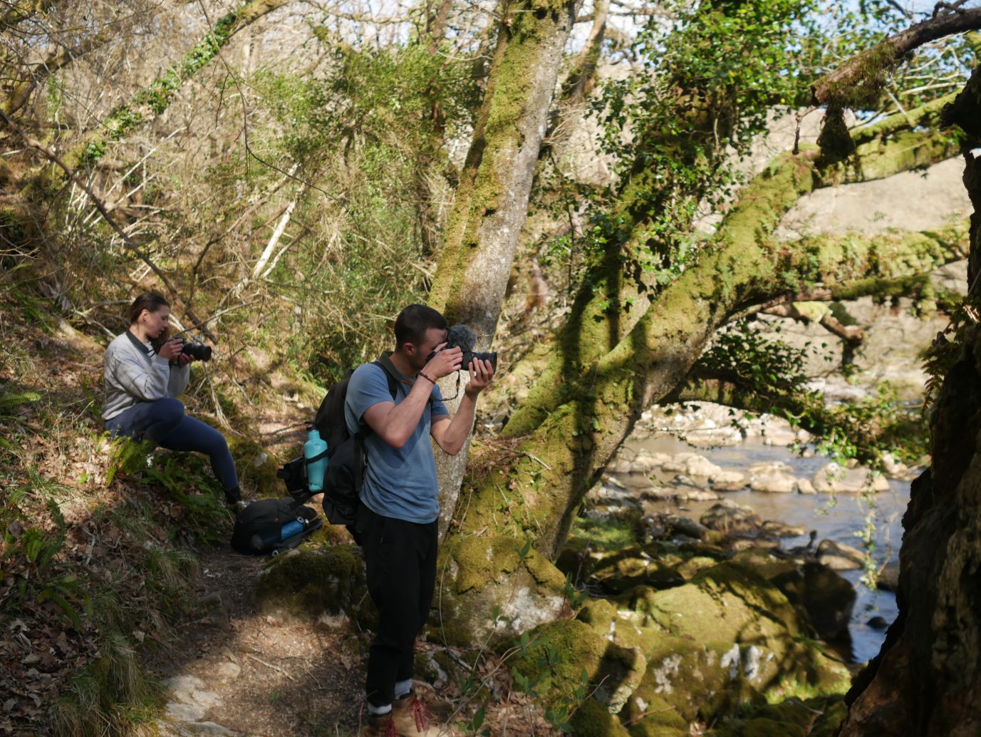 Olivia Chevallier and Louis Taylor operating their cameras during a film production trip to Dartmeer, Devon.